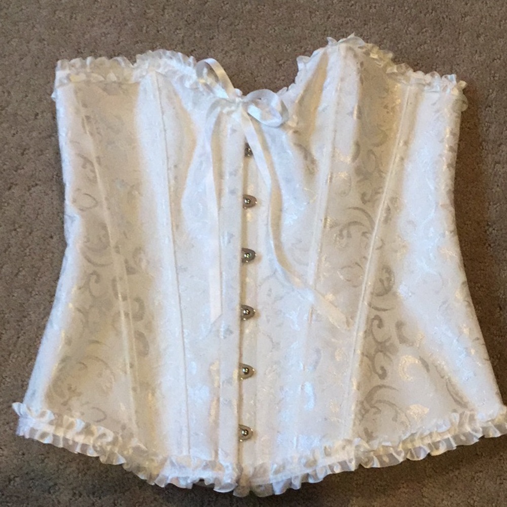 White elegant corset w/matching thong. Never worn!